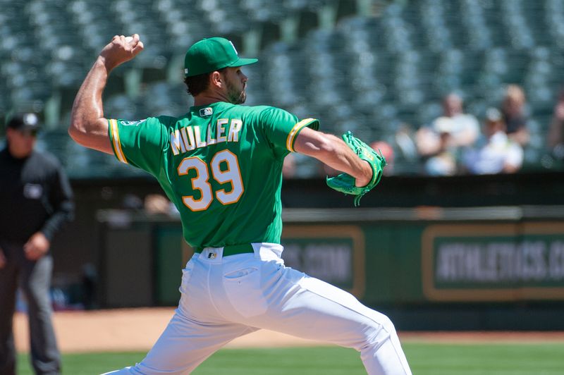 Apr 29, 2023; Oakland, California, USA; Oakland Athletics starting pitcher Kyle Muller (39) throws a pitch during the fourth inning against the Cincinnati Reds at RingCentral Coliseum. Mandatory Credit: Ed Szczepanski-USA TODAY Sports