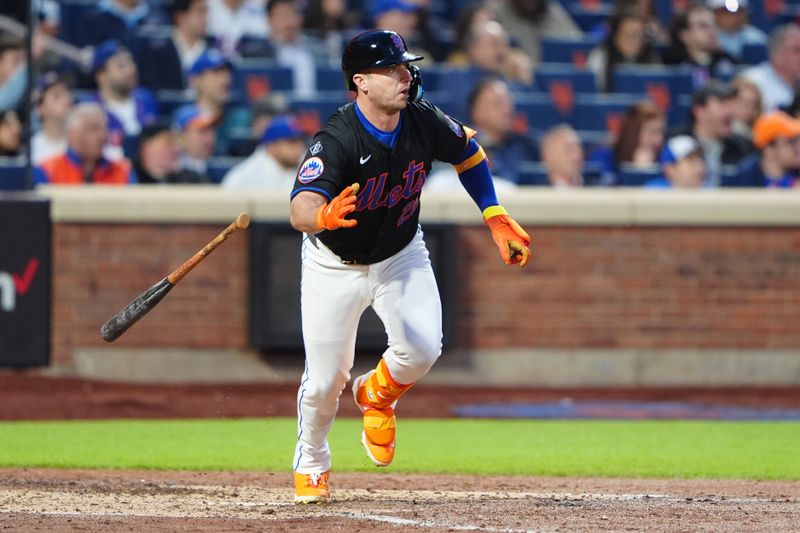 May 13, 2024; New York City, New York, USA; New York Mets first baseman Pete Alonso (20) runs out a single against the Philadelphia Phillies during the third inning at Citi Field. Mandatory Credit: Gregory Fisher-USA TODAY Sports