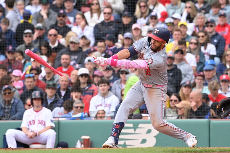 May 12, 2024; Boston, Massachusetts, USA;  Washington Nationals second baseman Luis Garcia Jr. (2) breaks a bat during the third inning against the Boston Red Sox at Fenway Park. Mandatory Credit: Eric Canha-USA TODAY Sports