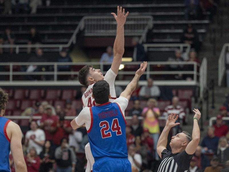 Mar 1, 2025; Stanford, California, USA;  Stanford Cardinal forward Maxime Raynaud (42) leaps up for the ball during the first half against Southern Methodist Mustangs center Samet Yigitoglu (24) at Maples Pavilion. Mandatory Credit: Stan Szeto-Imagn Images