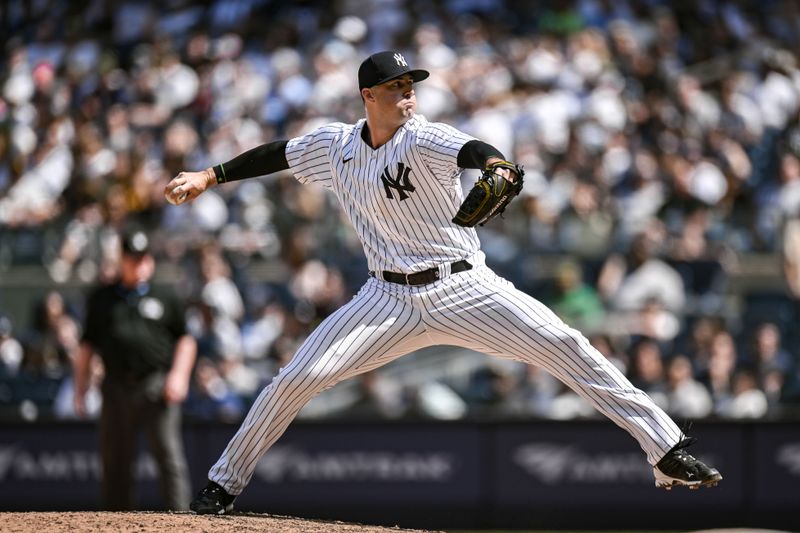 May 27, 2023; Bronx, New York, USA; New York Yankees relief pitcher Clay Holmes (35) pitches during the tenth inning against the San Diego Padres at Yankee Stadium. Mandatory Credit: John Jones-USA TODAY Sports