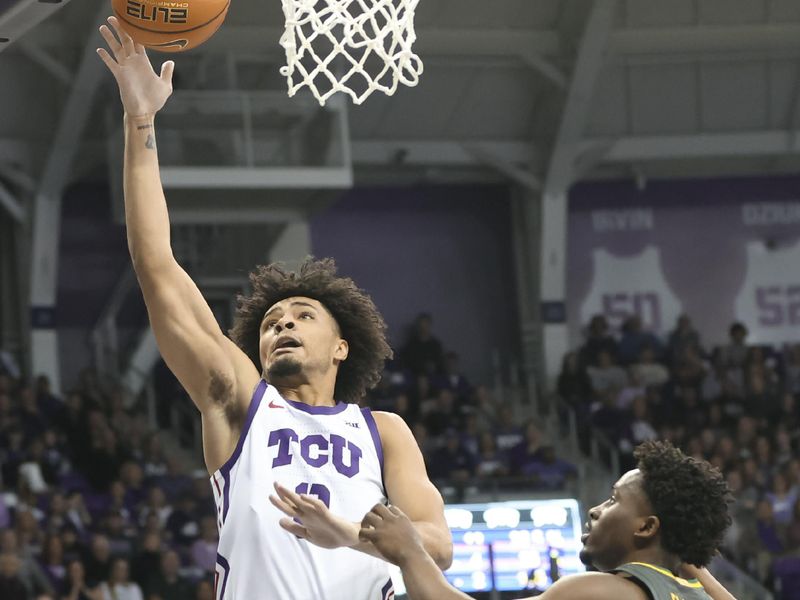 Feb 11, 2023; Fort Worth, Texas, USA;  TCU Horned Frogs guard Micah Peavy (0) shoots past Baylor Bears guard Adam Flagler (10) during the first half at Ed and Rae Schollmaier Arena. Mandatory Credit: Kevin Jairaj-USA TODAY Sports