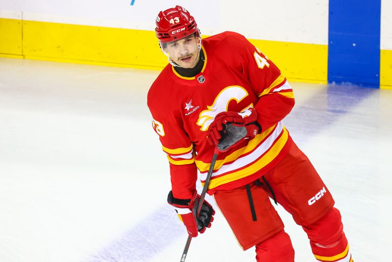 Nov 11, 2024; Calgary, Alberta, CAN; Calgary Flames right wing Adam Klapka (43) skates during the warmup period against the Los Angeles Kings at Scotiabank Saddledome. Mandatory Credit: Sergei Belski-Imagn Images