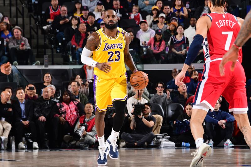 INGLEWOOD, CA - FEBRUARY 4: LeBron James #23 of the Los Angeles Lakers dribbles the ball during the game against the LA Clippers on February 4, 2025 at Intuit Dome in Los Angeles, California. NOTE TO USER: User expressly acknowledges and agrees that, by downloading and/or using this Photograph, user is consenting to the terms and conditions of the Getty Images License Agreement. Mandatory Copyright Notice: Copyright 2025 NBAE (Photo by Adam Pantozzi/NBAE via Getty Images)