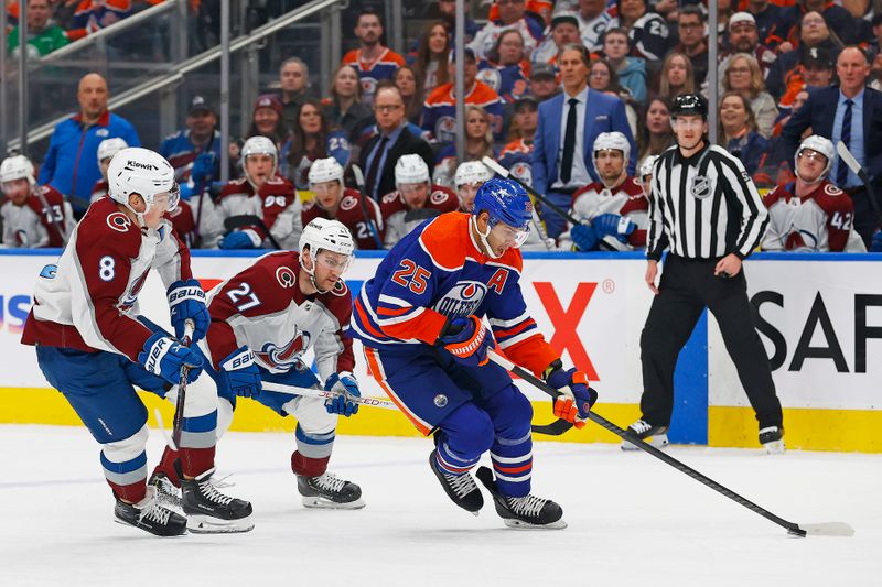 Mar 16, 2024; Edmonton, Alberta, CAN; Colorado Avalanche defensemen Cale Makar (8) and  forward Jonathan Drouin (27) chase Edmonton Oilers defensemen Darnell Nurse (25) during the first period at Rogers Place. Mandatory Credit: Perry Nelson-USA TODAY Sports