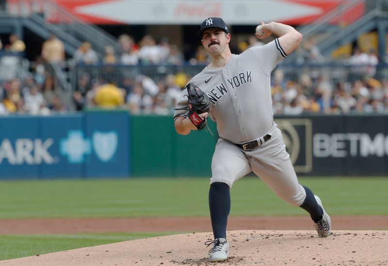 Sep 17, 2023; Pittsburgh, Pennsylvania, USA; New York Yankees starting pitcher Carlos Rodon (55) throws a pitch against the Pittsburgh Pirates during the first inning at PNC Park. Mandatory Credit: Charles LeClaire-USA TODAY Sports