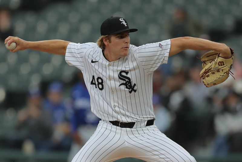 Apr 17, 2024; Chicago, Illinois, USA; Chicago White Sox starting pitcher Jonathan Cannon (48) throws the ball in the first inning of his MLB debut during game one of a double header against the Kansas City Royals at Guaranteed Rate Field. Mandatory Credit: Melissa Tamez-USA TODAY Sports
