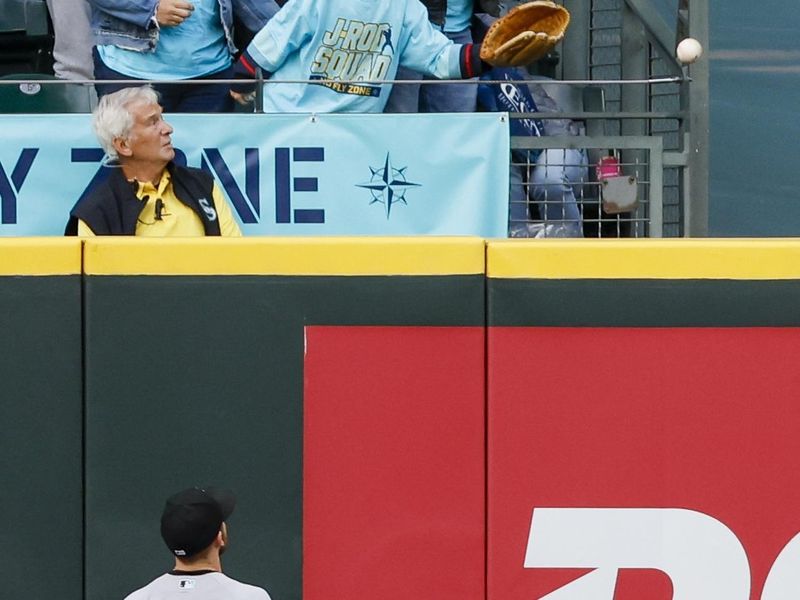 Jun 13, 2023; Seattle, Washington, USA; Miami Marlins center fielder Garrett Hampson (1) watches a two-run home run by Seattle Mariners designated hitter Mike Ford (20, not pictured) go over the wall during the fourth inning at T-Mobile Park. Mandatory Credit: Joe Nicholson-USA TODAY Sports