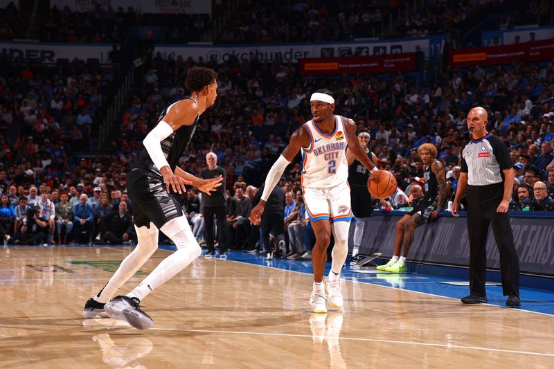 OKLAHOMA CITY, OK - OCTOBER 30: Shai Gilgeous-Alexander #2 of the Oklahoma City Thunder looks on during the game against the San Antonio Spurs on October 30, 2024 at Paycom Arena in Oklahoma City, Oklahoma. NOTE TO USER: User expressly acknowledges and agrees that, by downloading and or using this photograph, User is consenting to the terms and conditions of the Getty Images License Agreement. Mandatory Copyright Notice: Copyright 2024 NBAE (Photo by Zach Beeker/NBAE via Getty Images)