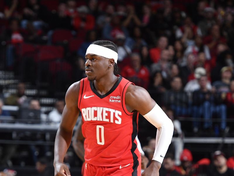 HOUSTON, TX - MARCH 21:   Aaron Holiday #0 of the Houston Rockets looks on during the game against the Chicago Bulls on March 21, 2024 at the Toyota Center in Houston, Texas. NOTE TO USER: User expressly acknowledges and agrees that, by downloading and or using this photograph, User is consenting to the terms and conditions of the Getty Images License Agreement. Mandatory Copyright Notice: Copyright 2024 NBAE (Photo by Logan Riely/NBAE via Getty Images)