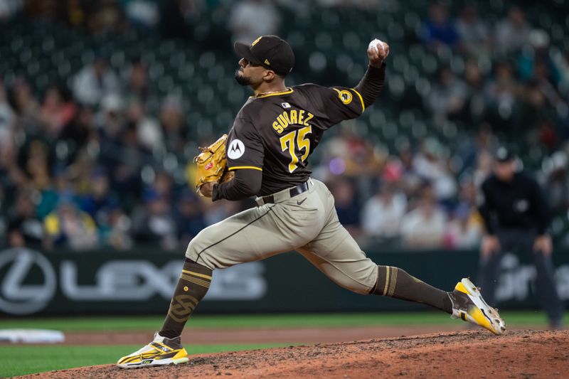 Sep 10, 2024; Seattle, Washington, USA;  San Diego Padres reliever Robert Suarez (75) delivers a pitch during the ninth inning against the Seattle Mariners at T-Mobile Park. Mandatory Credit: Stephen Brashear-Imagn Images