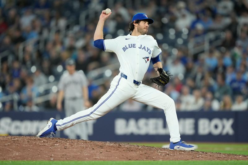 Apr 16, 2024; Toronto, Ontario, CAN; Toronto Blue Jays pitcher Jordan Romano (68) pitches to the New York Yankees during the ninth inning at Rogers Centre. Mandatory Credit: John E. Sokolowski-USA TODAY Sports