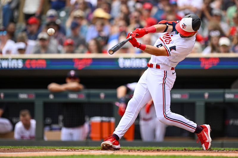 Jul 8, 2023; Minneapolis, Minnesota, USA;  Minnesota Twins infielder Edouard Julien (47) hits a double against the Baltimore Orioles during the first inning at Target Field. Mandatory Credit: Nick Wosika-USA TODAY Sports