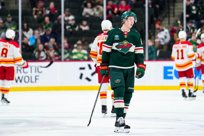 Jan 2, 2024; Saint Paul, Minnesota, USA; Minnesota Wild left wing Matt Boldy (12) reacts following the game against the Calgary Flames at Xcel Energy Center. Mandatory Credit: Brace Hemmelgarn-USA TODAY Sports