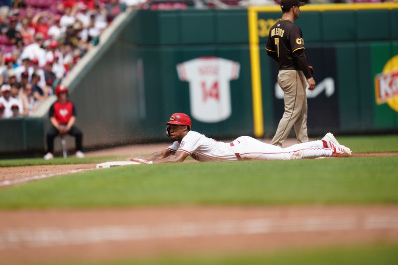 Jun 29, 2025; Cincinnati, Ohio, USA; Cincinnati Reds outfielder Will Benson (30) steals third base in the eighth inning against the San Diego Padres at Great American Ball Park. Mandatory Credit: Frank Bowen IV/ The USAToday Network via Imagn Images