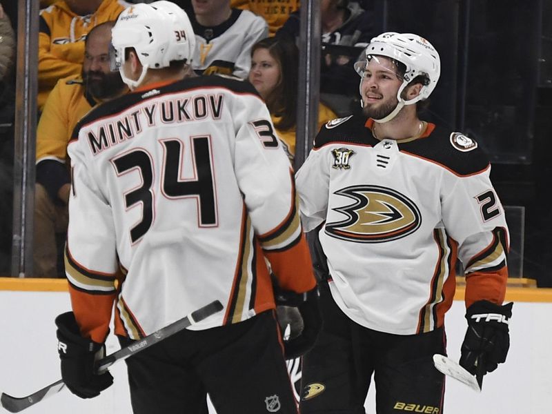 Jan 9, 2024; Nashville, Tennessee, USA; Anaheim Ducks center Mason McTavish (23) celebrates after scoring inner at Bridgestone Arena. Mandatory Credit: Christopher Hanewinckel-USA TODAY Sports