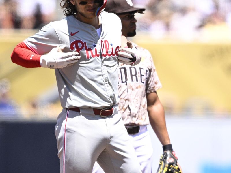 Apr 28, 2024; San Diego, California, USA; Philadelphia Phillies third baseman Alec Bohm (28) gestures after hitting a double during the first inning against the San Diego Padres at Petco Park. Mandatory Credit: Orlando Ramirez-USA TODAY Sports