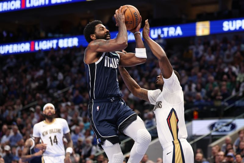 DALLAS, TEXAS - NOVEMBER 19: Kyrie Irving #11 of the Dallas Mavericks is defended by Javonte Green #4 of the New Orleans Pelicans during the first half of an Emirates NBA Cup game at American Airlines Center on November 19, 2024 in Dallas, Texas. NOTE TO USER: User expressly acknowledges and agrees that, by downloading and/or using this photograph, user is consenting to the terms and conditions of the Getty Images License Agreement. (Photo by Sam Hodde/Getty Images)