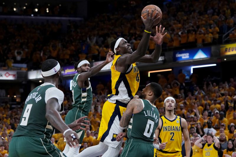 INDIANAPOLIS, INDIANA - APRIL 26: Pascal Siakam #43 of the Indiana Pacers attempts a shot while being fouled by Damian Lillard #0 of the Milwaukee Bucks in the fourth quarter during game three of the Eastern Conference First Round Playoffs at Gainbridge Fieldhouse on April 26, 2024 in Indianapolis, Indiana. NOTE TO USER: User expressly acknowledges and agrees that, by downloading and or using this photograph, User is consenting to the terms and conditions of the Getty Images License Agreement. (Photo by Dylan Buell/Getty Images)