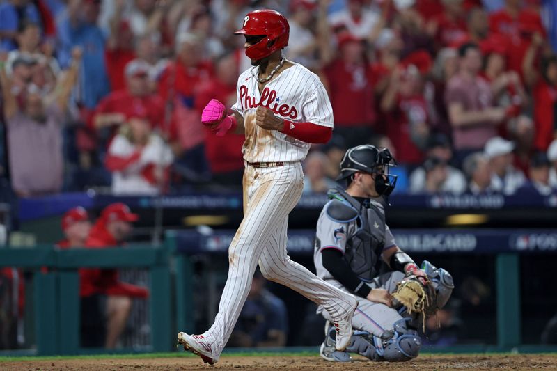 Oct 3, 2023; Philadelphia, Pennsylvania, USA; Philadelphia Phillies center fielder Johan Rojas (18) scores a run in the third inning for game one of the Wildcard series against the Miami Marlins for the 2023 MLB playoffs at Citizens Bank Park. Mandatory Credit: Bill Streicher-USA TODAY Sports