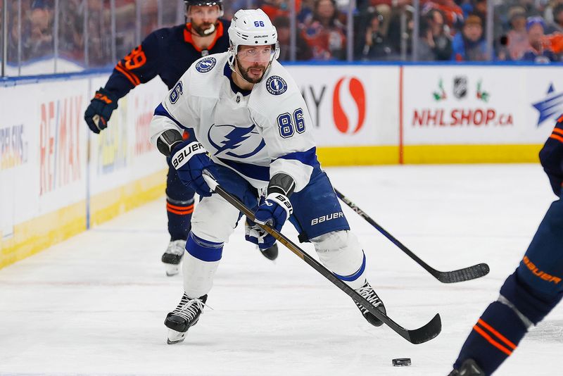 Dec 14, 2023; Edmonton, Alberta, CAN; Tampa Bay Lightning forward Nikita Kucherov (86) carries the puck against the Edmonton Oilers at Rogers Place. Mandatory Credit: Perry Nelson-USA TODAY Sports