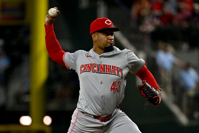 Apr 27, 2024; Arlington, Texas, USA; Cincinnati Reds relief pitcher Alexis Diaz (43) pitches against the Texas Rangers during the ninth inning at Globe Life Field. Mandatory Credit: Jerome Miron-USA TODAY Sports