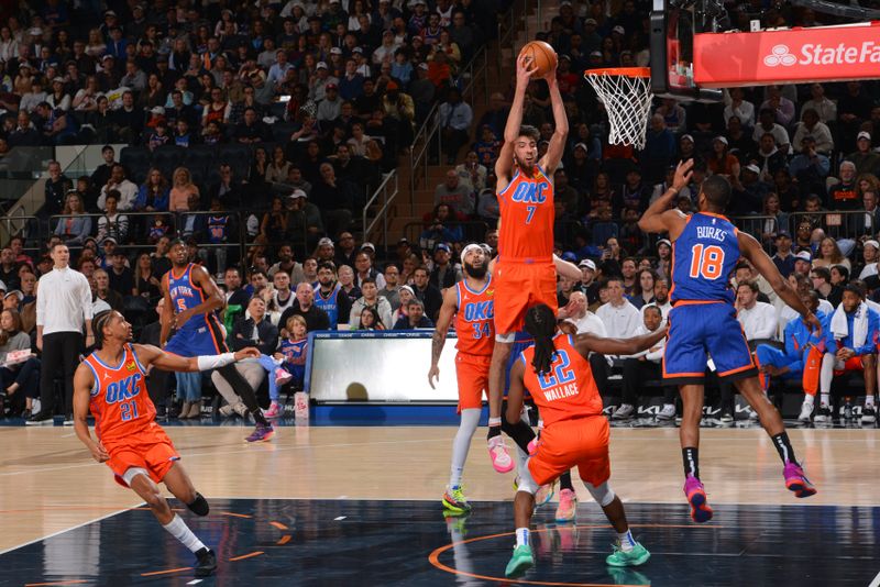 NEW YORK, NY - MARCH 31: Chet Holmgren #7 of the Oklahoma City Thunder rebounds the ball during the game against the New York Knicks on March 31, 2024 at Madison Square Garden in New York City, New York.  NOTE TO USER: User expressly acknowledges and agrees that, by downloading and or using this photograph, User is consenting to the terms and conditions of the Getty Images License Agreement. Mandatory Copyright Notice: Copyright 2024 NBAE  (Photo by Jesse D. Garrabrant/NBAE via Getty Images)