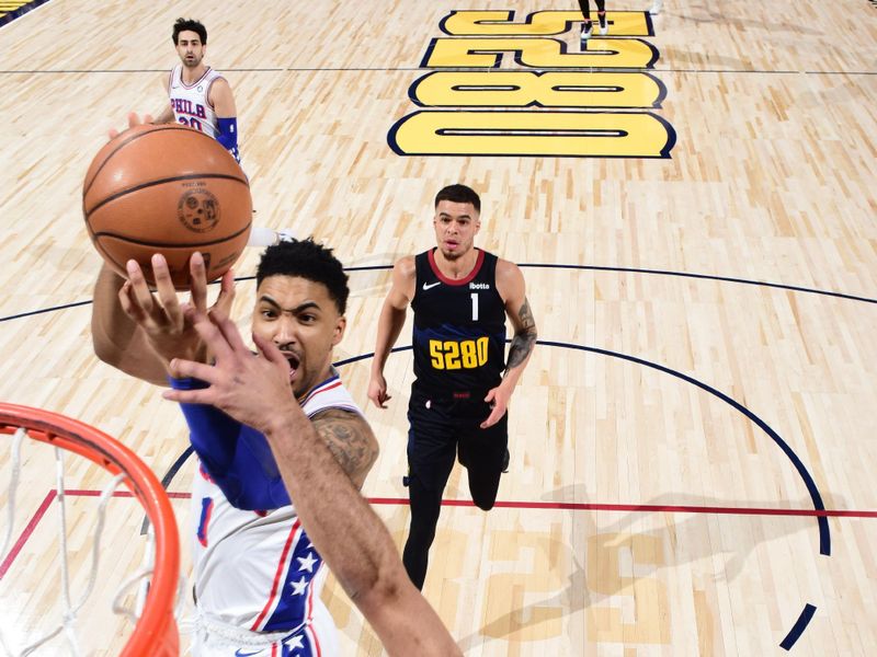 DENVER, CO - JANUARY 27: Kenyon Martin Jr. #1 of the Philadelphia 76ers drives to the basket during the game against the Denver Nuggets on January 27, 2024 at the Ball Arena in Denver, Colorado. NOTE TO USER: User expressly acknowledges and agrees that, by downloading and/or using this Photograph, user is consenting to the terms and conditions of the Getty Images License Agreement. Mandatory Copyright Notice: Copyright 2024 NBAE (Photo by Garrett Ellwood/NBAE via Getty Images)