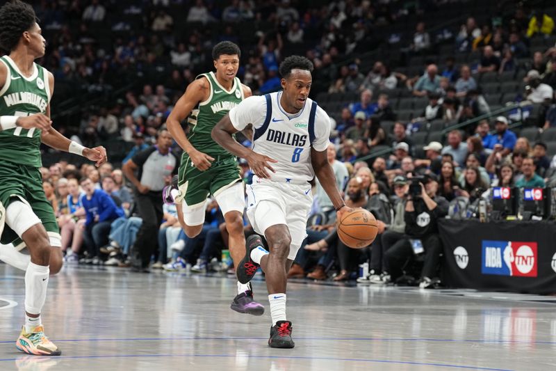 DALLAS, TX - OCTOBER 17: Olivier Maxence-Prosper #8 of the Dallas Mavericks dribbles the ball during the game against the Milwaukee Bucks during a NBA preseason game on October 17, 2024 at American Airlines Center in Dallas, Texas. NOTE TO USER: User expressly acknowledges and agrees that, by downloading and or using this photograph, User is consenting to the terms and conditions of the Getty Images License Agreement. Mandatory Copyright Notice: Copyright 2024 NBAE (Photo by Glenn James/NBAE via Getty Images)