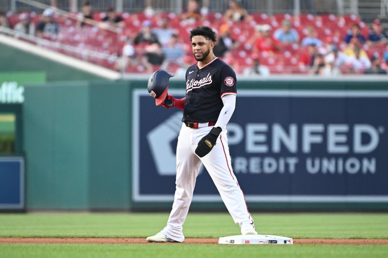 Aug 5, 2024; Washington, District of Columbia, USA; Washington Nationals second baseman Luis Garcia Jr. (2) takes is helmet off after stealing second base against the San Francisco Giants during the fourth inning at Nationals Park. Mandatory Credit: Rafael Suanes-USA TODAY Sports