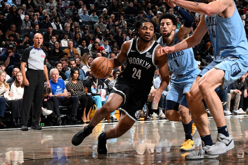 BROOKLYN, NY - NOVEMBER 4: Cam Thomas #24 of the Brooklyn Nets dribbles the ball during the game against the Memphis Grizzlies on November 4, 2024 at Barclays Center in Brooklyn, New York. NOTE TO USER: User expressly acknowledges and agrees that, by downloading and or using this Photograph, user is consenting to the terms and conditions of the Getty Images License Agreement. Mandatory Copyright Notice: Copyright 2024 NBAE (Photo by David Dow<p><br/></p>/NBAE via Getty Images)