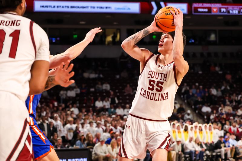 Jan 28, 2026; Columbia, South Carolina, USA; South Carolina Gamecocks guard Mike Sharavjamts (55) shoots against the Florida Gators in the first half at Colonial Life Arena. Mandatory Credit: Jeff Blake-Imagn Images