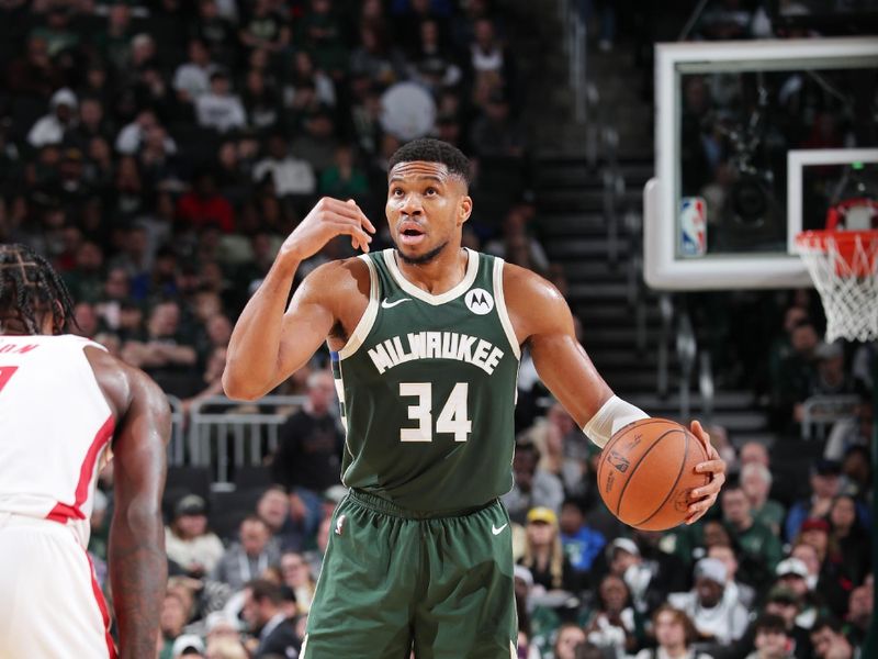 MILWAUKEE, WI - NOVEMBER 18: Giannis Antetokounmpo #34 of the Milwaukee Bucks looks to pass the ball during the game against the Houston Rockets on November 18, 2024 at the Fiserv Forum Center in Milwaukee, Wisconsin. NOTE TO USER: User expressly acknowledges and agrees that, by downloading and or using this Photograph, user is consenting to the terms and conditions of the Getty Images License Agreement. Mandatory Copyright Notice: Copyright 2024 NBAE (Photo by Gary Dineen/NBAE via Getty Images).