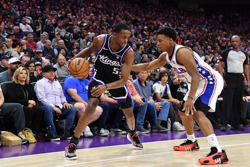 SACRAMENTO, CA - March 25:  De'Aaron Fox #5 of the Sacramento Kings handles the ball during the game against the Philadelphia 76ers on March 25, 2024 at Golden 1 Center in Sacramento, California. NOTE TO USER: User expressly acknowledges and agrees that, by downloading and or using this Photograph, user is consenting to the terms and conditions of the Getty Images License Agreement. Mandatory Copyright Notice: Copyright 2024 NBAE (Photo by Juan Ocampo/NBAE via Getty Images)