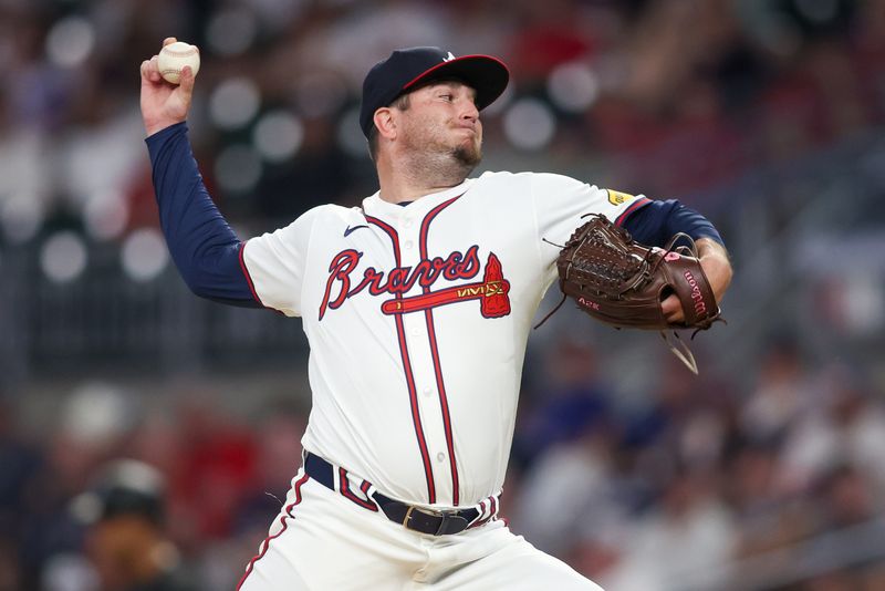 Aug 1, 2024; Atlanta, Georgia, USA; Atlanta Braves relief pitcher Luke Jackson (22) throws against the Miami Marlins in the seventh inning at Truist Park. Mandatory Credit: Brett Davis-USA TODAY Sports
