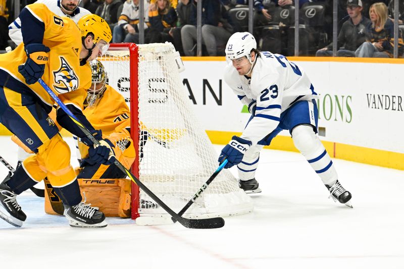 Dec 20, 2025; Nashville, Tennessee, USA;  Nashville Predators left wing Erik Haula (56) blocks the shot of Toronto Maple Leafs left wing Matthew Knies (23) during the second period at Bridgestone Arena. Mandatory Credit: Steve Roberts-Imagn Images