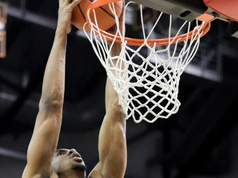 Mar 4, 2023; Columbia, Missouri, USA; Mississippi Rebels forward Robert Allen (21) dunks the ball against the Missouri Tigers during the second half at Mizzou Arena. Mandatory Credit: Denny Medley-USA TODAY Sports