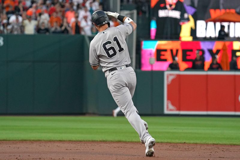 Jul 30, 2023; Baltimore, Maryland, USA; New York Yankees outfielder Jake Bauers (61) rounds the bases following his solo home run in the third inning against the Baltimore Orioles at Oriole Park at Camden Yards. Mandatory Credit: Mitch Stringer-USA TODAY Sports