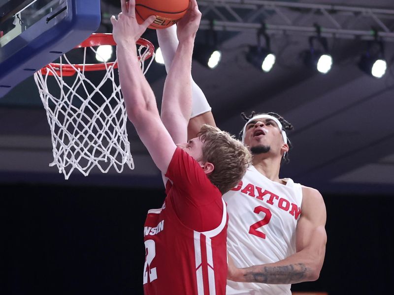 Nov 23, 2022; Paradise Island, BAHAMAS; Dayton Flyers forward Toumani Camara (2) blocks the shot odf Wisconsin Badgers forward Steven Crowl (22) during the second half at Imperial Arena. Mandatory Credit: Kevin Jairaj-USA TODAY Sports