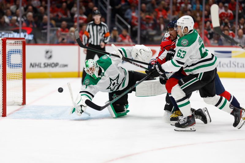 Oct 17, 2024; Washington, District of Columbia, USA; Washington Capitals left wing Alex Ovechkin (8) and Dallas Stars right wing Evgenii Dadonov (63) battles for the puck in front of Stars goaltender Casey DeSmith (1) in the third period at Capital One Arena. Mandatory Credit: Geoff Burke-Imagn Images