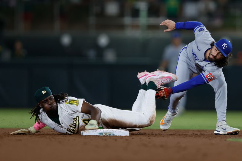 Sep 26, 2025; West Sacramento, California, USA; Athletics center fielder Lawrence Butler (4) steals second base during the second inning against the Kansas City Royals at Sutter Health Park. Mandatory Credit: Sergio Estrada-Imagn Images