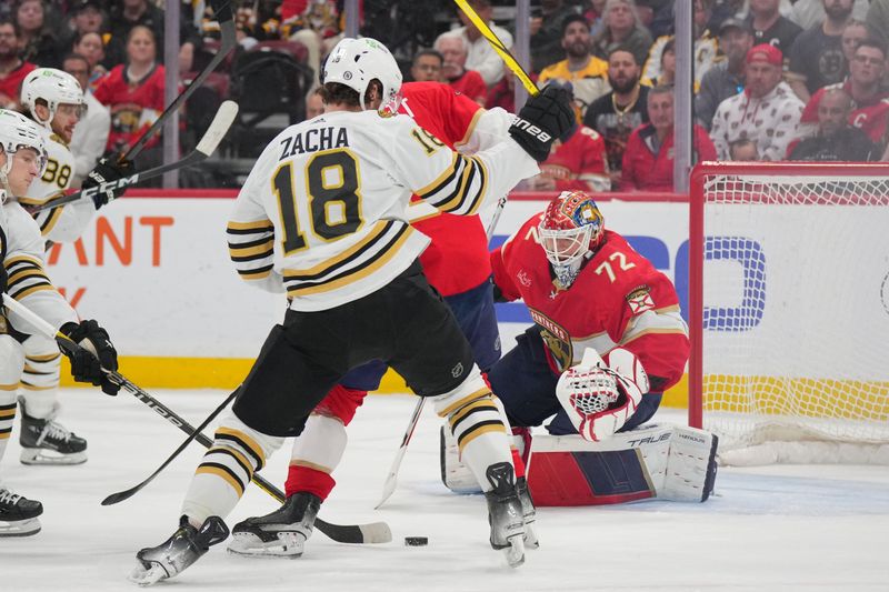 Mar 26, 2024; Sunrise, Florida, USA; Florida Panthers goaltender Sergei Bobrovsky (72) keeps his eye on the puck against the Boston Bruins in the first period at Amerant Bank Arena. Mandatory Credit: Jim Rassol-USA TODAY Sports