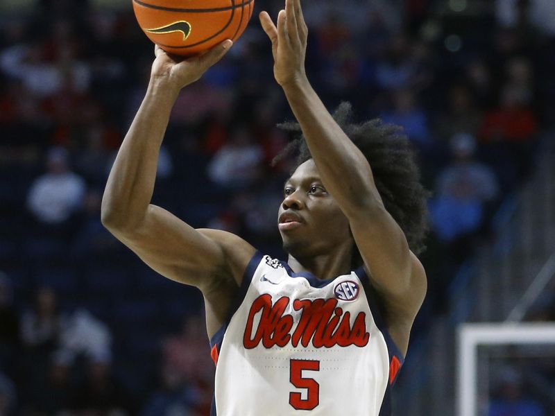 Jan 10, 2024; Oxford, Mississippi, USA; Mississippi Rebels guard Jaylen Murray (5) shoots for three during the second half against the Florida Gators at The Sandy and John Black Pavilion at Ole Miss. Mandatory Credit: Petre Thomas-USA TODAY Sports