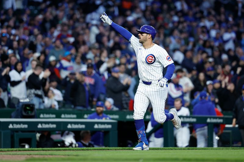 Apr 23, 2024; Chicago, Illinois, USA; Chicago Cubs outfielder Mike Tauchman (40) rounds the bases after hitting a three-run home run against the Houston Astros during the first inning at Wrigley Field. Mandatory Credit: Kamil Krzaczynski-USA TODAY Sports