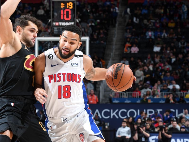 DETROIT, MI - NOVEMBER 27: Cory Joseph #18 of the Detroit Pistons drives to the basket during the game against the Cleveland Cavaliers on November 27, 2022 at Little Caesars Arena in Detroit, Michigan. NOTE TO USER: User expressly acknowledges and agrees that, by downloading and/or using this photograph, User is consenting to the terms and conditions of the Getty Images License Agreement. Mandatory Copyright Notice: Copyright 2022 NBAE (Photo by Chris Schwegler/NBAE via Getty Images)