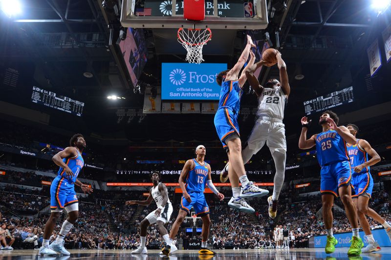 SAN ANTONIO, TX - OCTOBER 7: Malaki Branham #22 of the San Antonio Spurs shoots the ball during the game against the Oklahoma City Thunder during a NBA preseason game on October 7, 2024 at the Frost Bank Center in San Antonio, Texas. NOTE TO USER: User expressly acknowledges and agrees that, by downloading and or using this photograph, user is consenting to the terms and conditions of the Getty Images License Agreement. Mandatory Copyright Notice: Copyright 2024 NBAE (Photos by Michael Gonzales/NBAE via Getty Images)