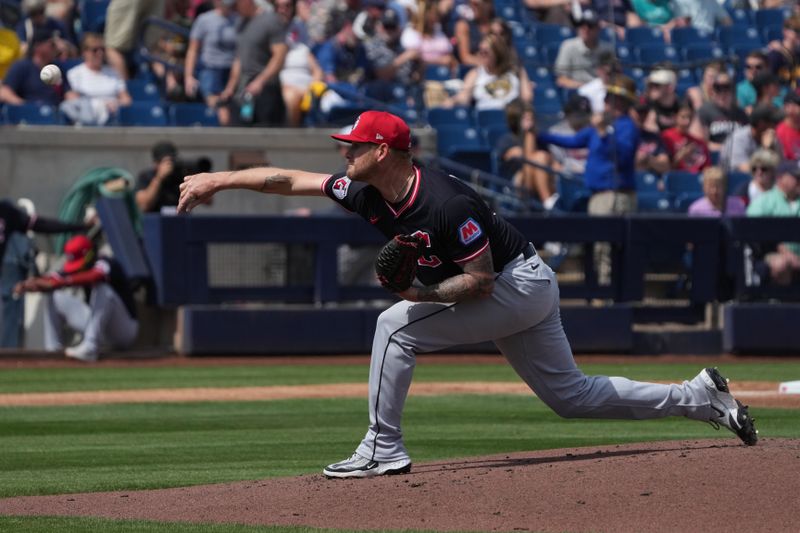 Mar 16, 2025; Phoenix, Arizona, USA; Cleveland Guardians pitcher Ben Lively (39) throws against the Milwaukee Brewers in the first inning at American Family Fields of Phoenix. Mandatory Credit: Rick Scuteri-Imagn Images