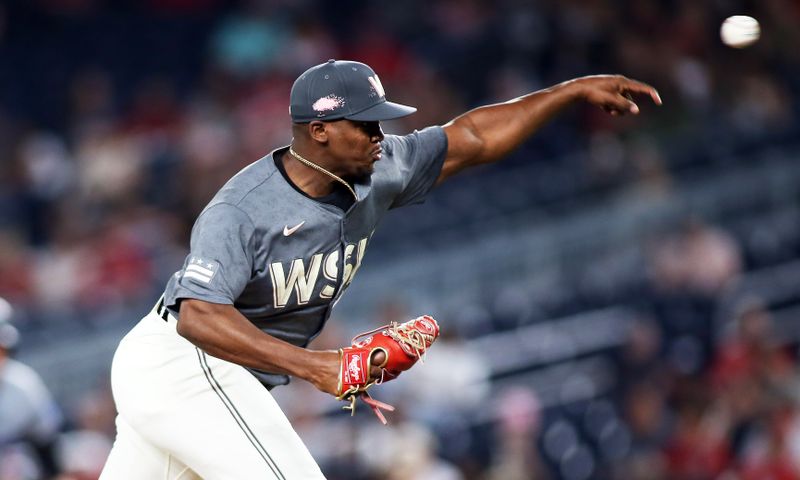 Sep 13, 2024; Washington, District of Columbia, USA; Washington Nationals pitcher Jose Ferrer (47) delivers a throw during the seventh inning against the Miami Marlins at Nationals Park. Mandatory Credit: Daniel Kucin Jr.-Imagn Images

