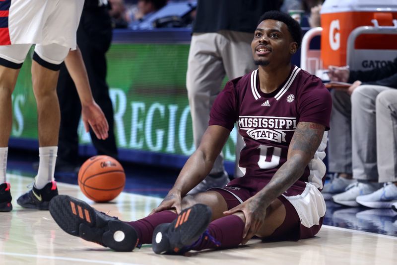 Feb 18, 2023; Oxford, Mississippi, USA; Mississippi State Bulldogs forward D.J. Jeffries (0) sits on the court during the first half against the Mississippi Rebels at The Sandy and John Black Pavilion at Ole Miss. Mandatory Credit: Petre Thomas-USA TODAY Sports