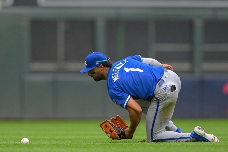 May 27, 2024; Minneapolis, Minnesota, USA; Kansas City Royals outfielder MJ Melendez (1) eyes the ball he dropped against the Minnesota Twins during the eighth inning at Target Field. Mandatory Credit: Nick Wosika-USA TODAY Sports